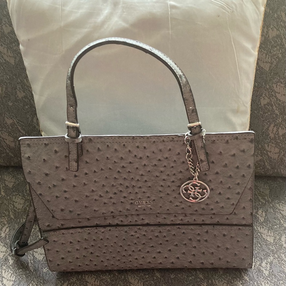 New Guess Bag with extra cross body strap .